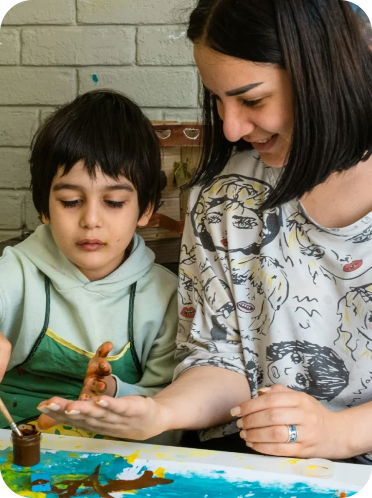 Mother and son painting